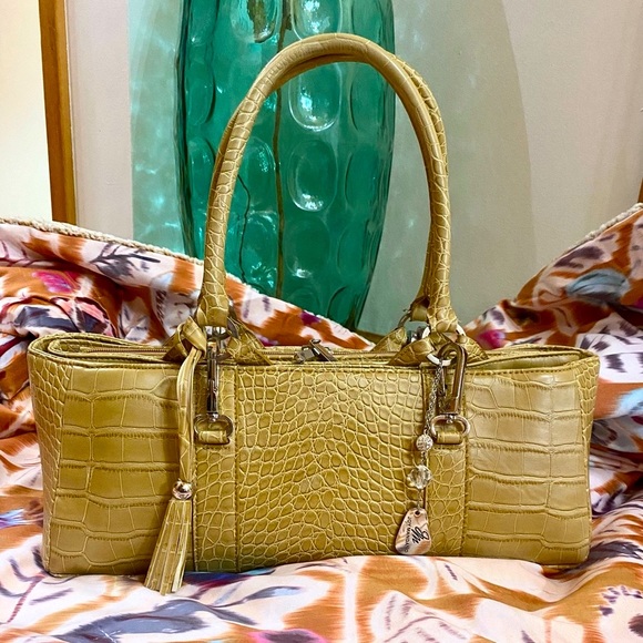 Joy Mangano Handbags - Joy Mangano shoulder/tote bag. Tassel, silver hardware and expandable.